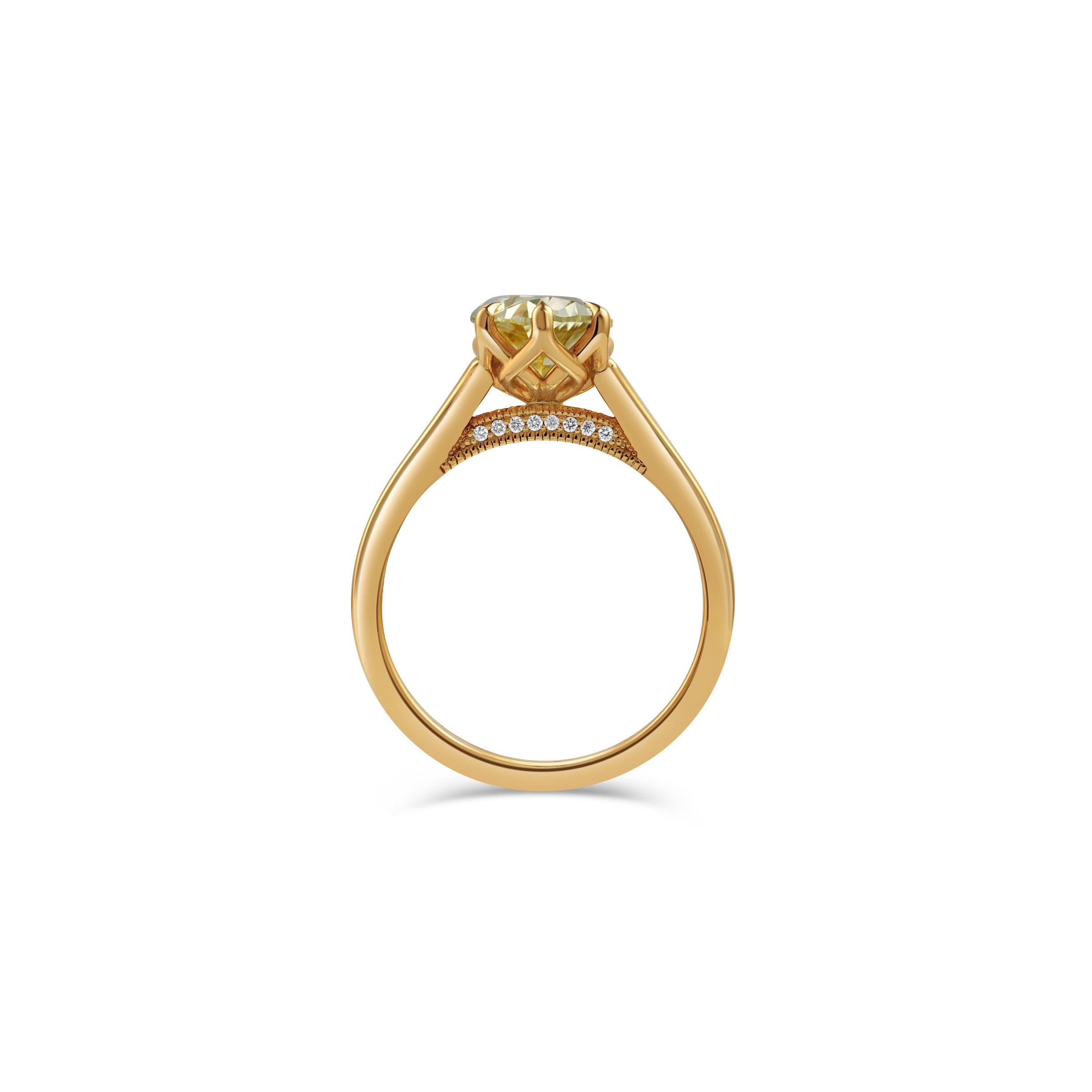 Profile of the yellow oval solitaire, showing a hidden row of diamonds beneath the stone